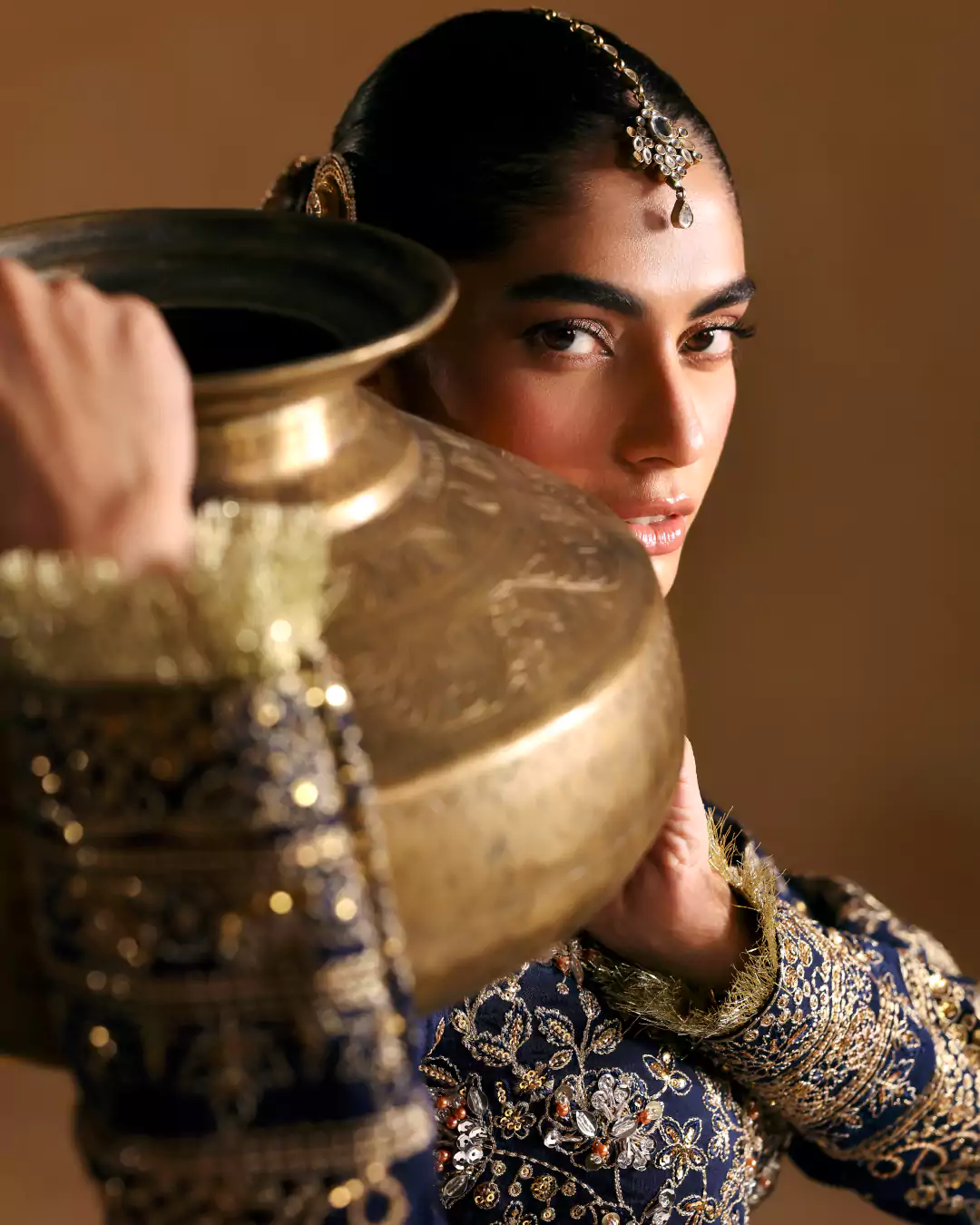 Model posing for Gulaal festive campaign shoot in Lahore