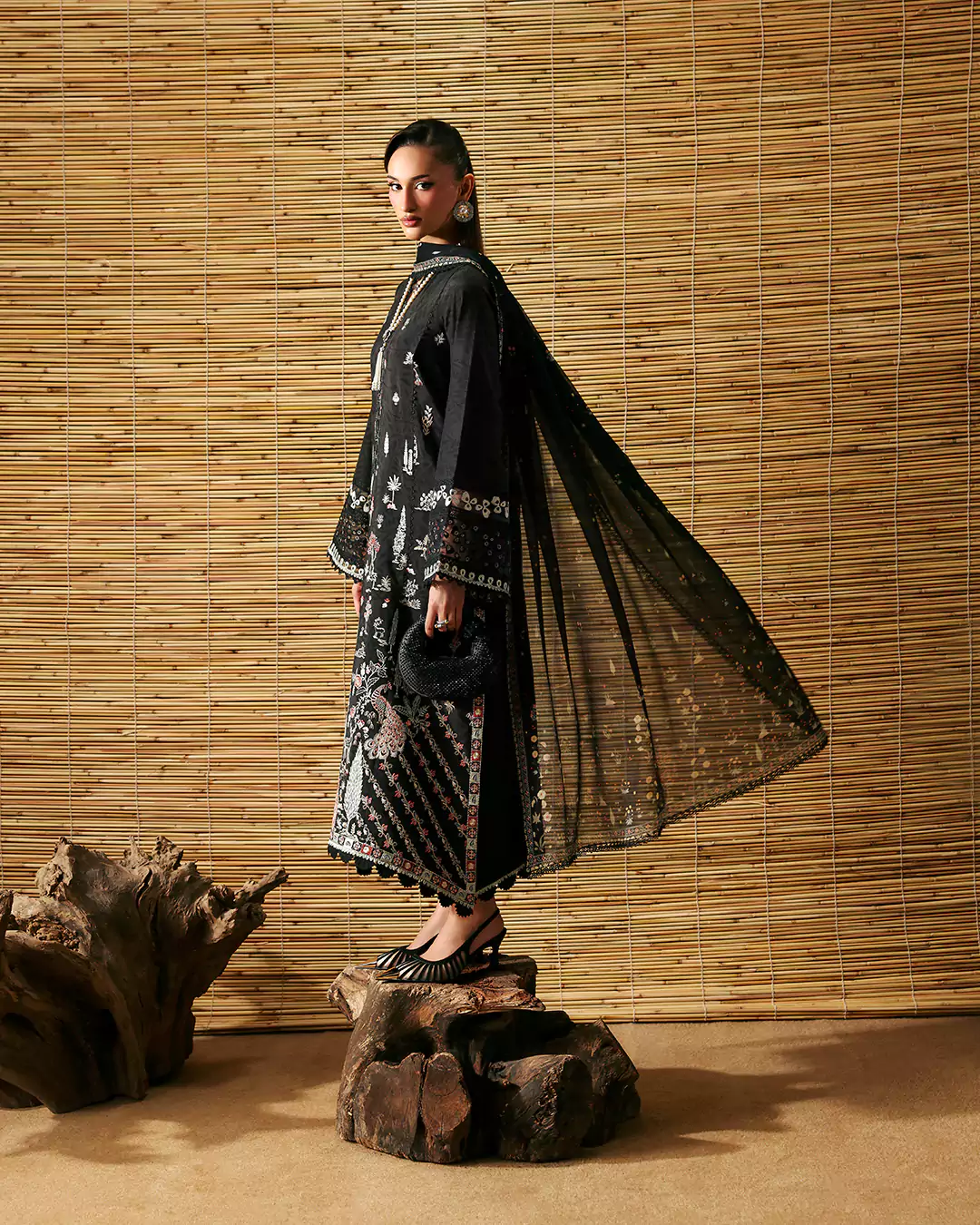 Outdoor lawn photoshoot in Lahore highlighting SABLE V luxury collection