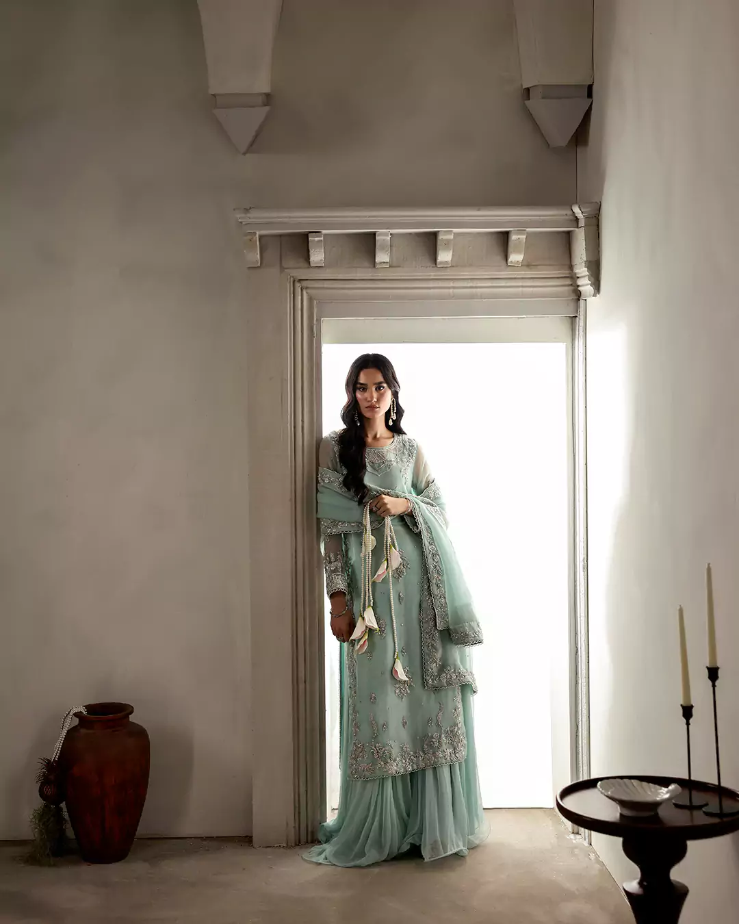 Full-length view of festive outfit captured in warm golden hour lighting for Hina Muzaffar campaign