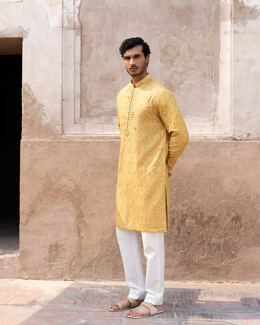 Close-up of Hazure menswear festive outfit highlighting fabric texture and tailoring details
