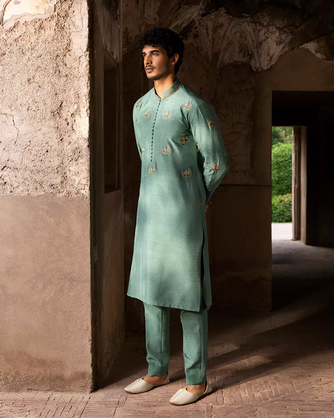 Portrait of model in Hazure menswear highlighting clean styling and contemporary fashion direction