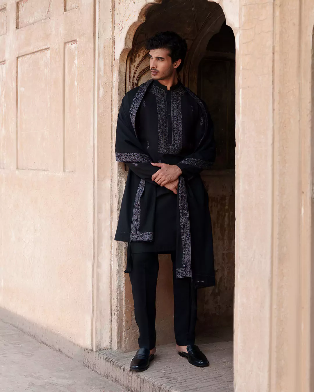 Close detail of Hazure menswear outfit emphasizing craftsmanship and festive design elements