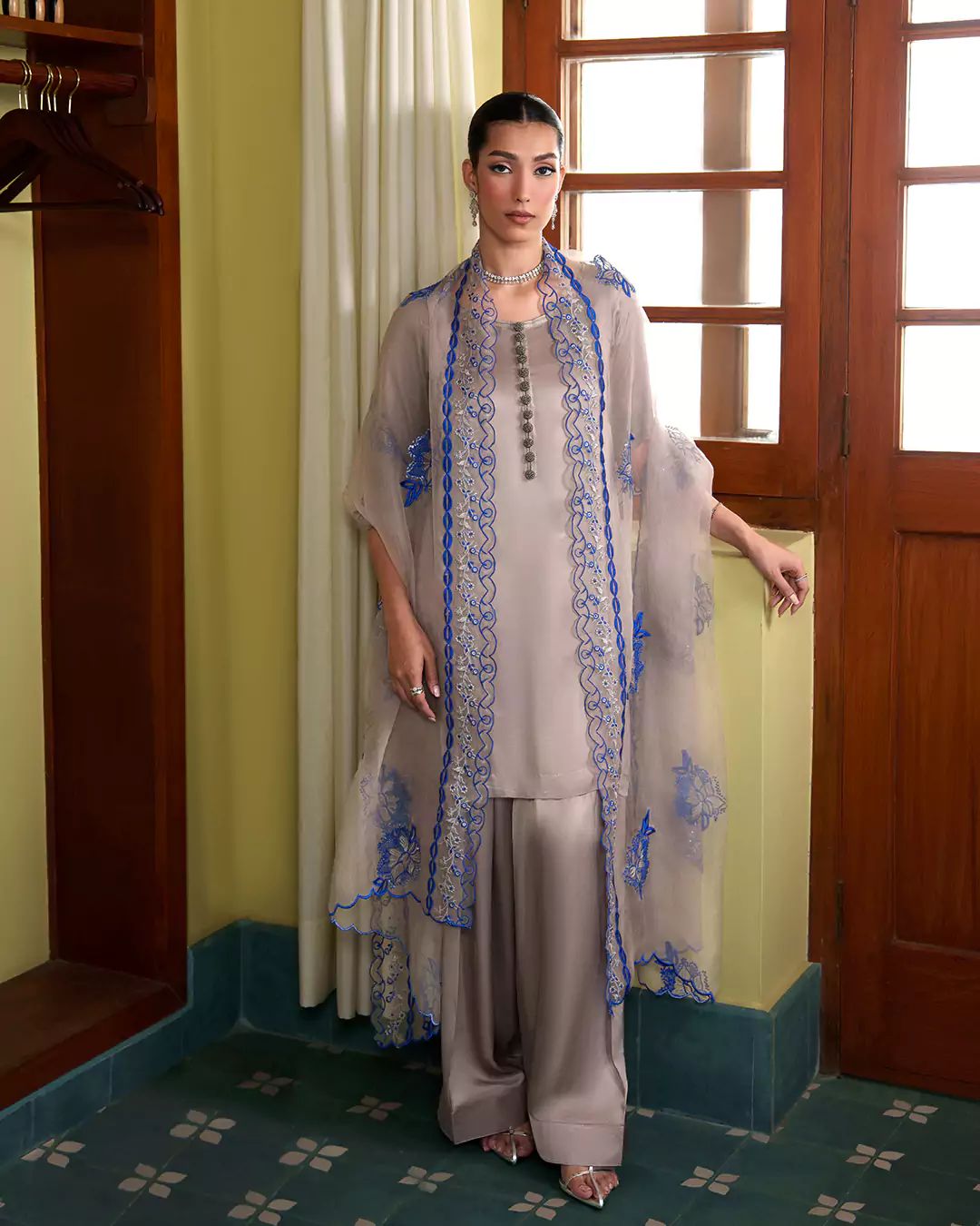 KALZARII Formals Collection 2026 featuring a model in a light blue printed formal outfit
