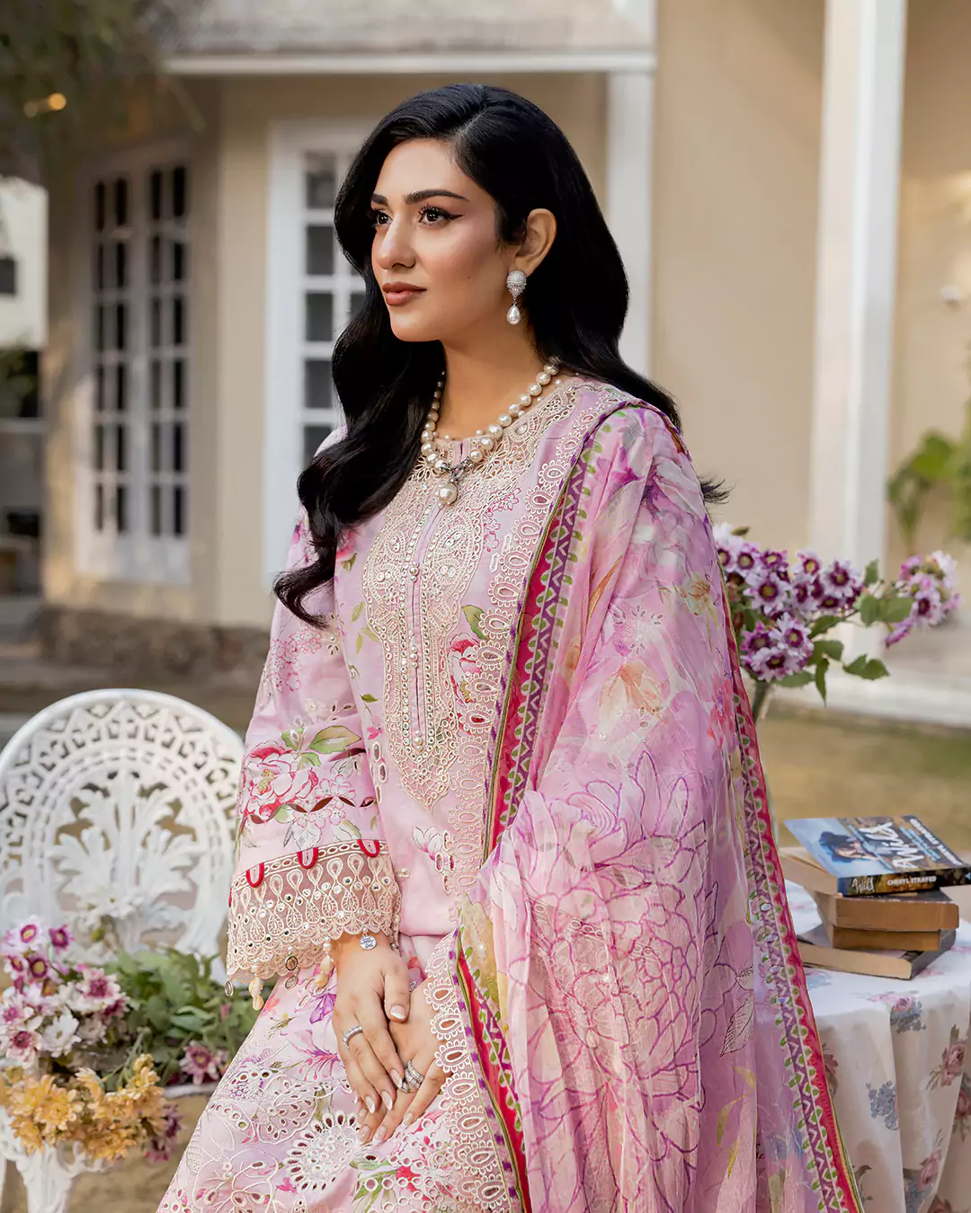 Sarah Falak showcasing a Farah Stores Lawn Pret fashion look in the 2026 campaign