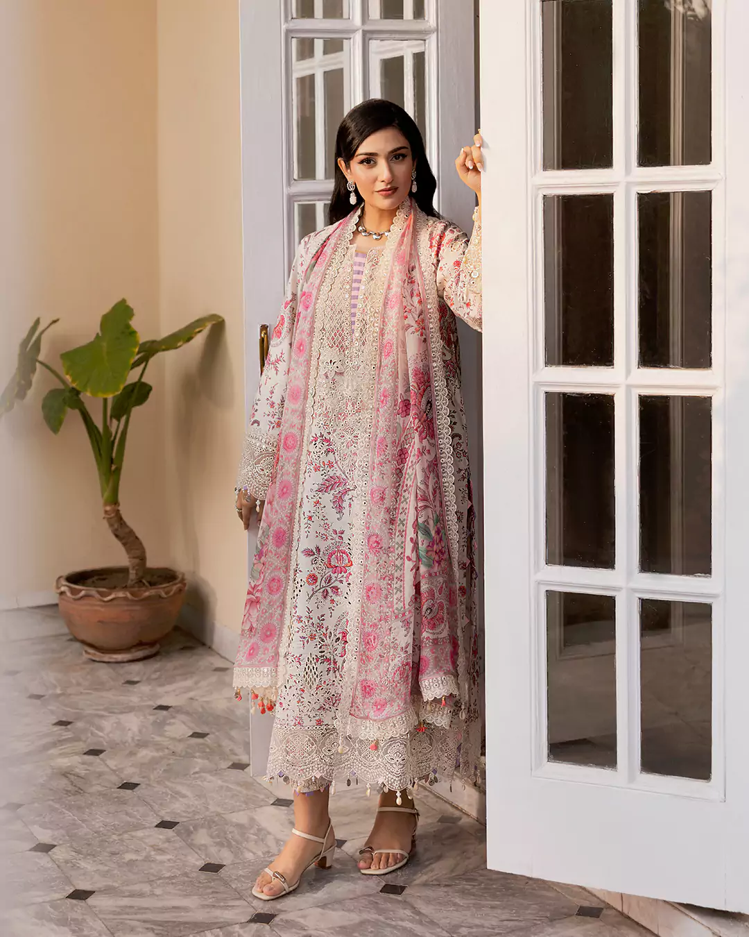 Sarah Falak wearing a Farah Stores Lawn Pret look in the 2026 celebrity campaign